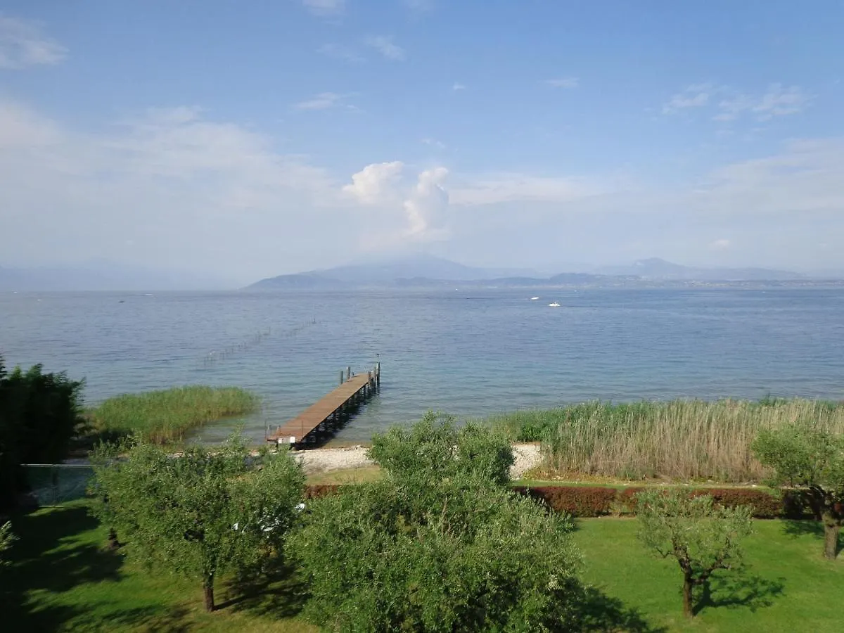 Сasa de vacaciones Bmp Apartment Orchidea Piscina, Giardino E Spiaggia Con Molo Sirmione